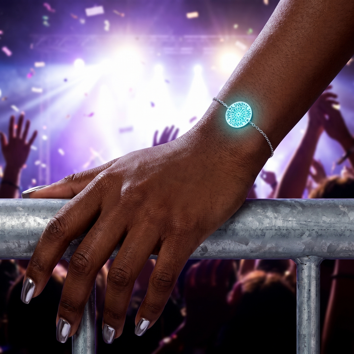Luminous Shrine Bracelet worn at night. Front row, hand on the barrier.