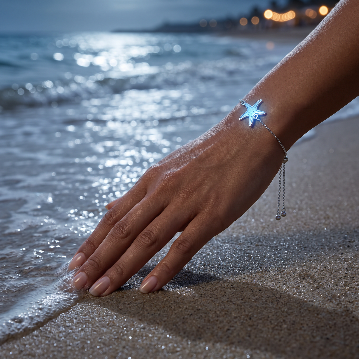 Luminous Starfish Bracelet worn at night. Moonlit shoreline after the party.