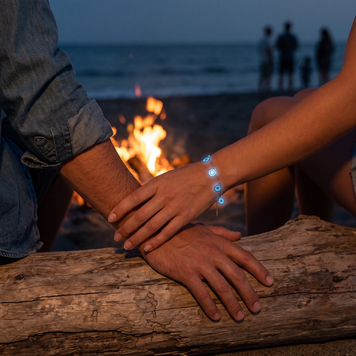 Luminous Nature Bracelet worn at night. Beach bonfire, couple.