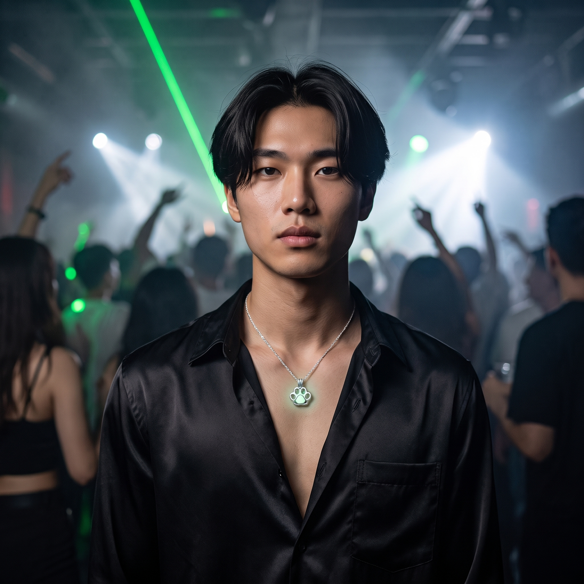 Luminous Cat Paw Necklace worn at night. Techno club, green laser.