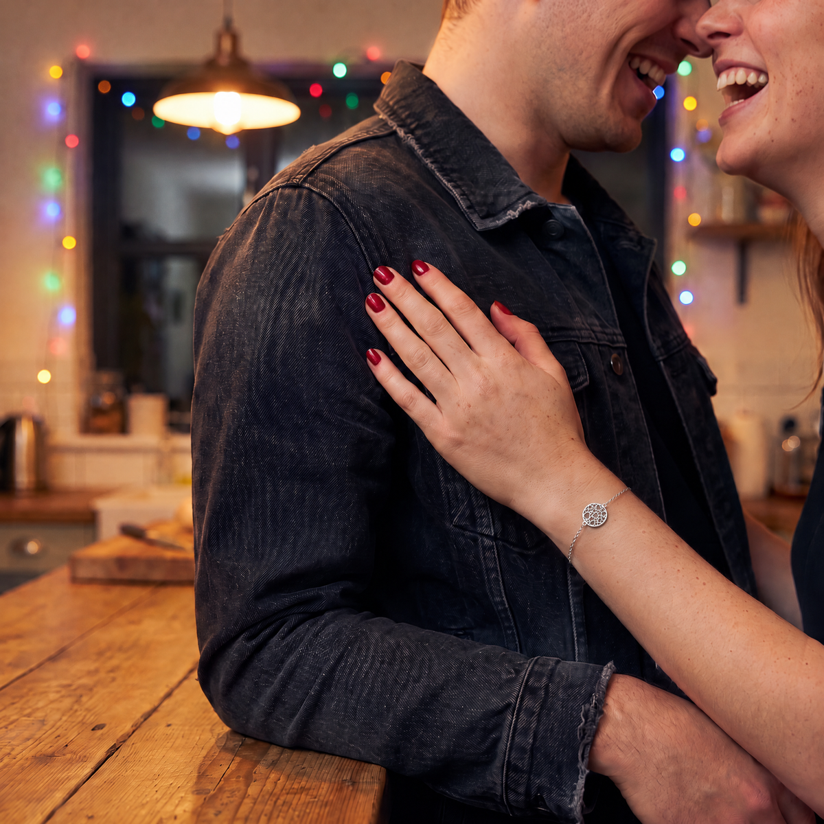Luminous Heart Texture Bracelet worn at night. House party kitchen, 2am, couple.