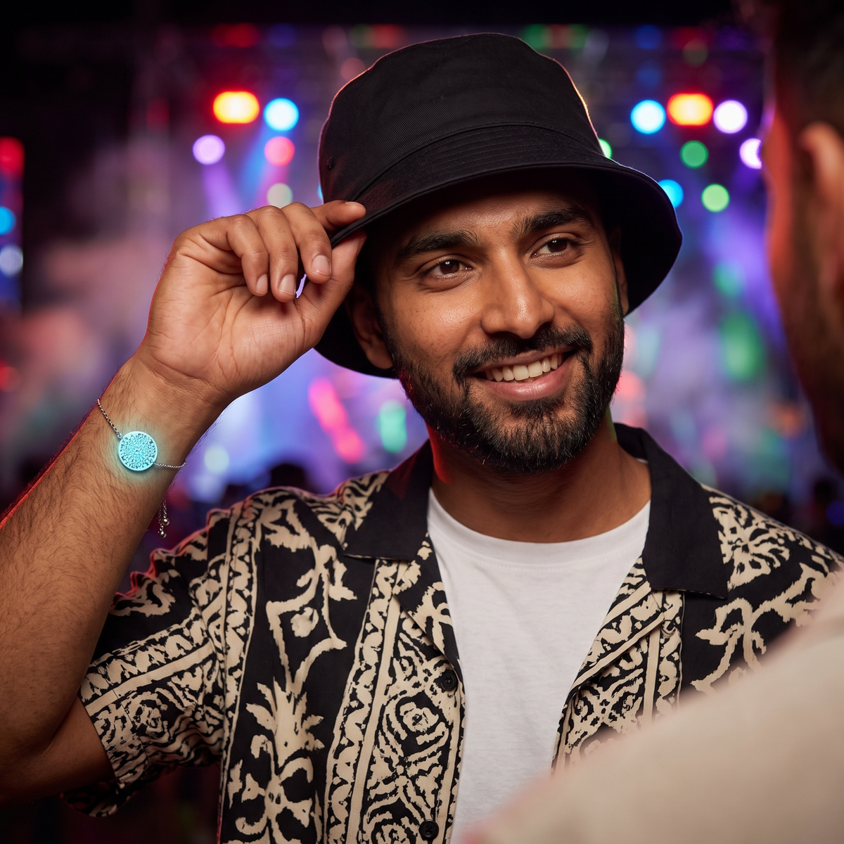 Luminous Shrine Bracelet worn at night. Bucket hat at the festival.