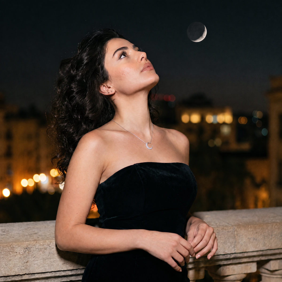 Aureole Moissanite Moonlight Necklace worn on a terrace under the moon